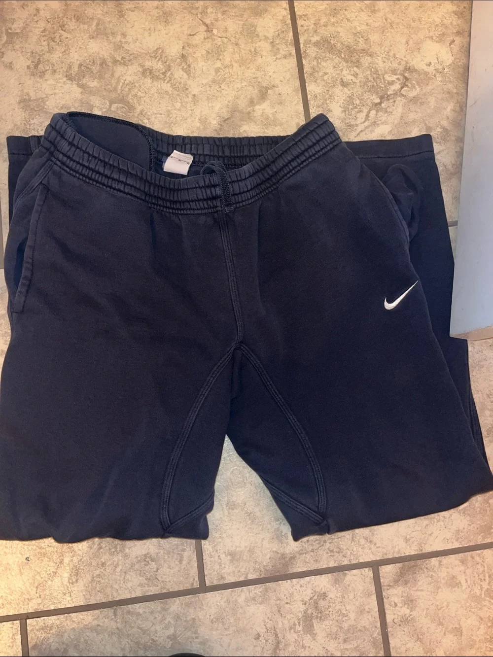 Nike Black Jogger Sweatpants with White Swoosh